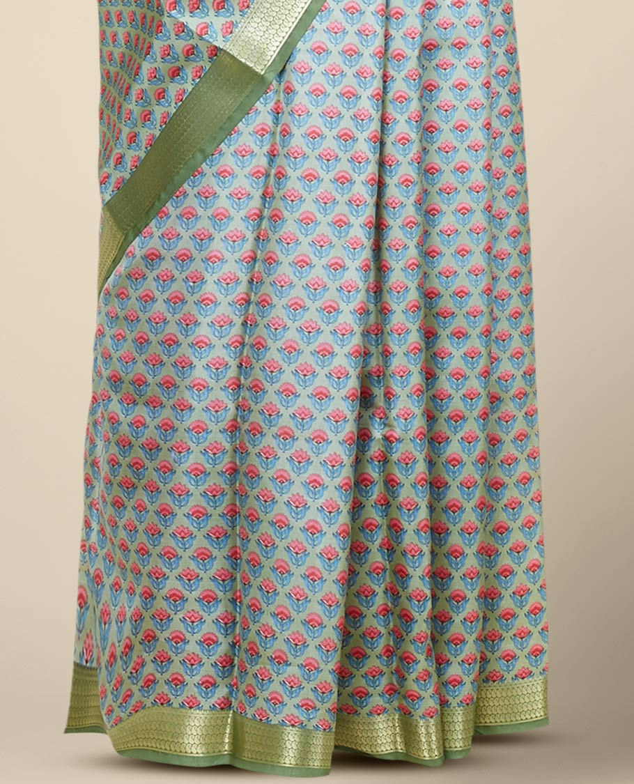 Green floral motifs printed silk saree, contrast zari border steeped with paisley designs