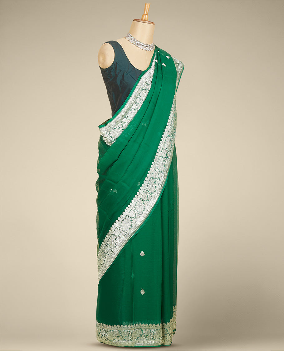 Green banaras georgette saree with buttas, traditional border with floral creeper designs