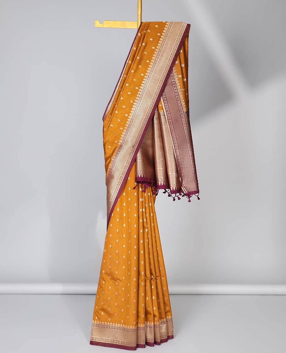 Orange zari buttas semi-banaras dola silk saree, contrast traditional border & pallu of stripes