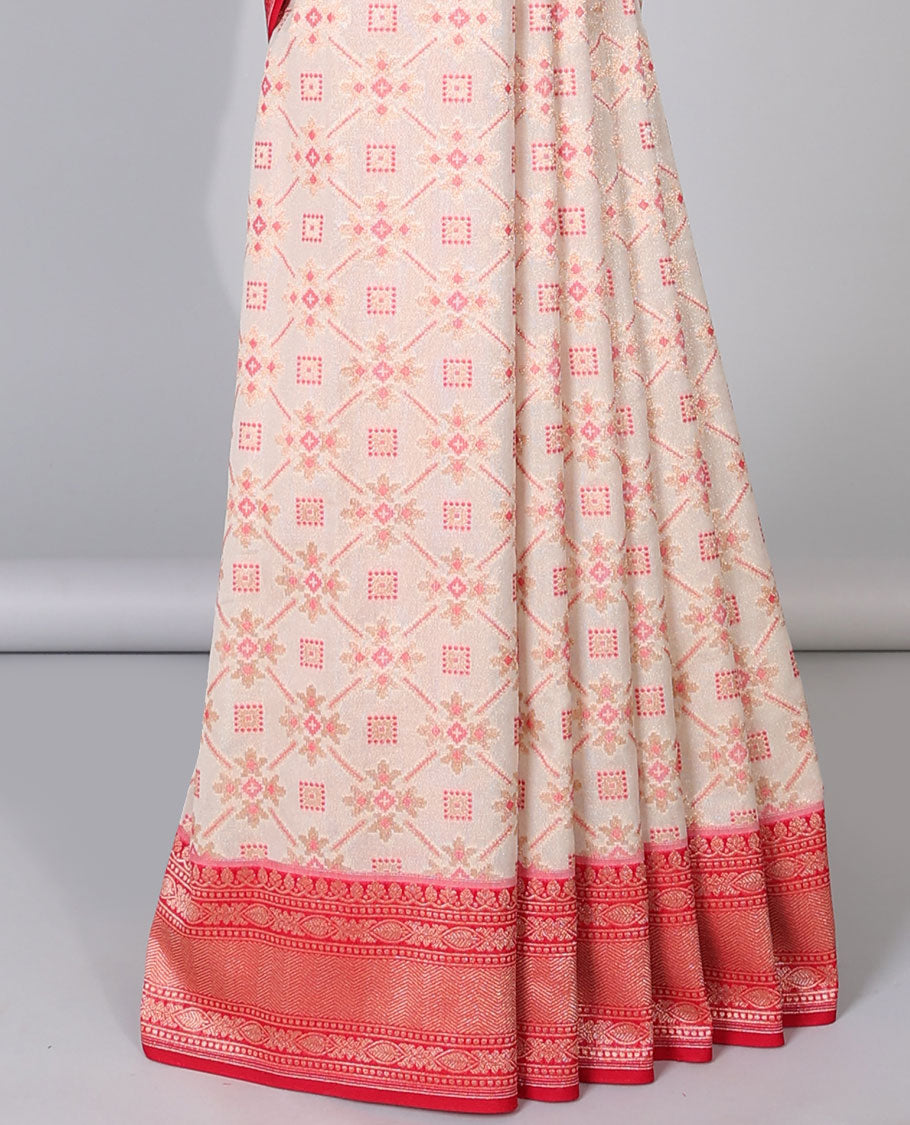 Cream patola-style designed semi-banaras tissue saree, contrast traditional zari border & intricate pallu