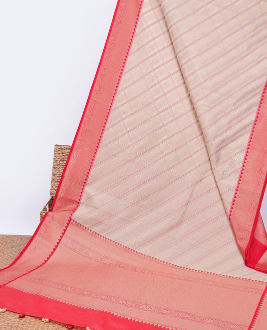 Cream diagonal striped semi-banaras tissue saree, contrast traditional zari border & intricate pallu