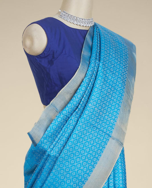 Blue geometric ogee patterned tusser silk saree, zari border