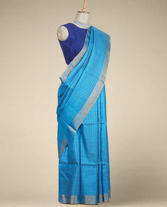 Blue geometric ogee patterned tusser silk saree, zari border