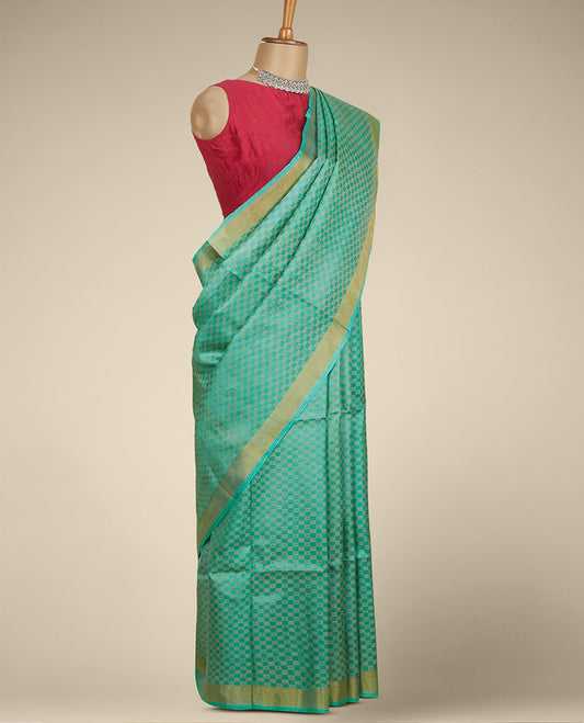 Green intricate checked tusser silk saree, zari border