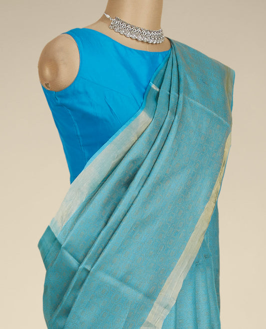 Blue geometric ogee patterned tusser silk saree, zari border