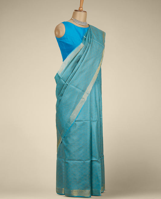 Blue geometric ogee patterned tusser silk saree, zari border