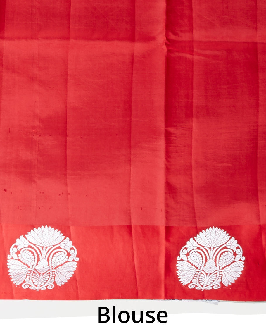 Red banaras raw mango silk saree features floral zari buttas, intricate floral zari design border