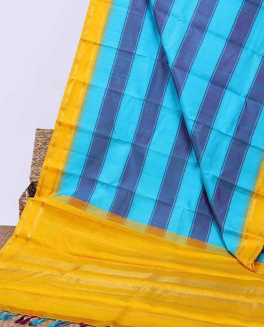Blue striped kancheepuram silksaree, contrast zari striped pallu & border of temple rettai pettu border of muthu design