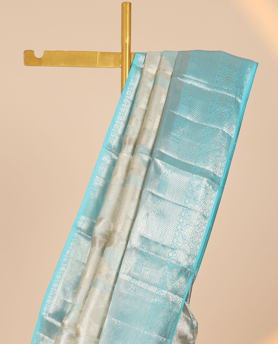 Grey jacquard kancheepuram tissue silk saree, contrast border of thilakam,poun & mayil kann & intricate pallu