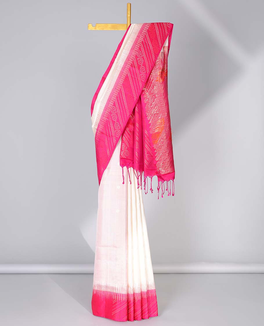 Cream striped soft silk saree with buttas, contrast striped border of bandhani dots & pallu of bandhani dots