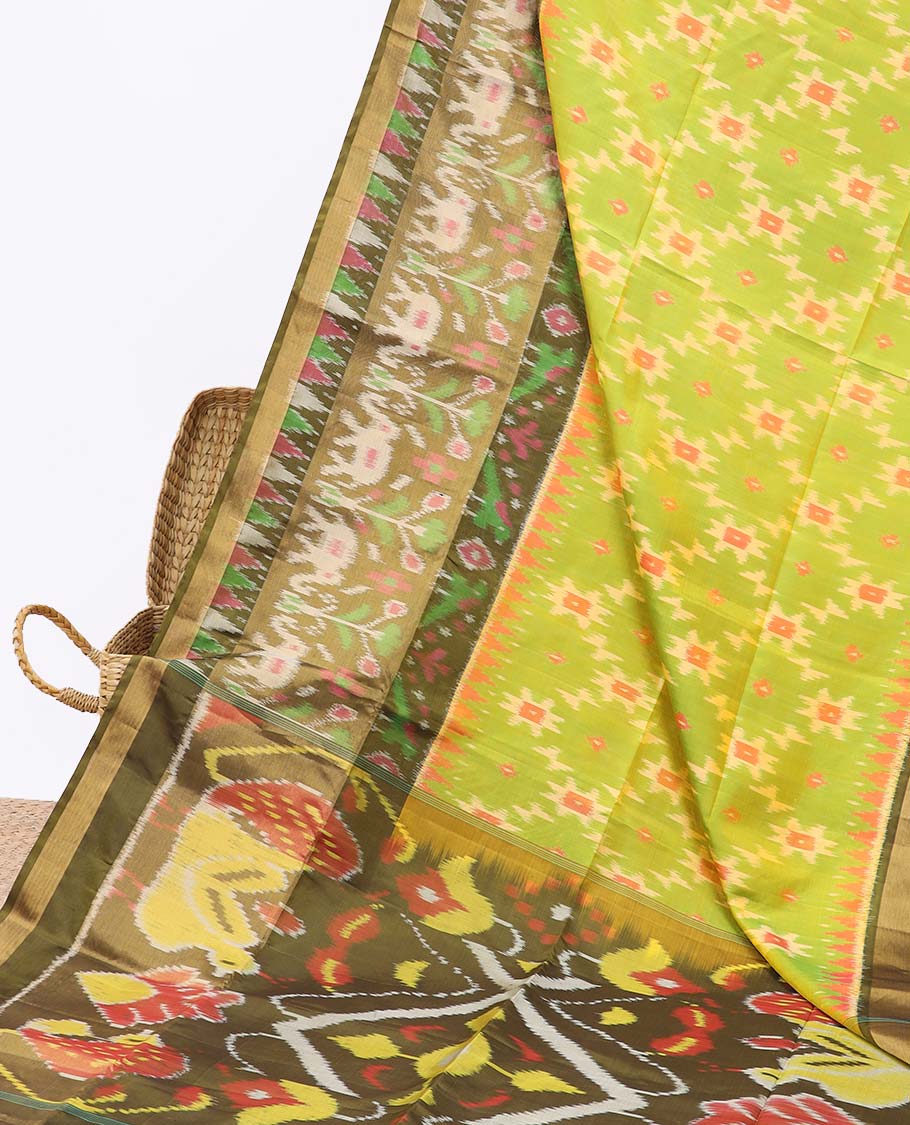 Green ikkat jaal design soft silk saree, contrast elephant motifs border & pallu of intricate ikkat designs