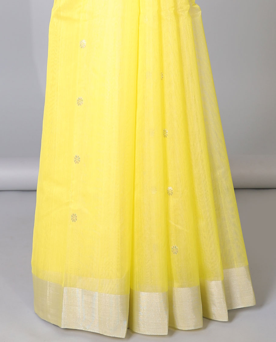 Yellow Chanderi cotton saree with buttas, plain border & floral zari design pallu