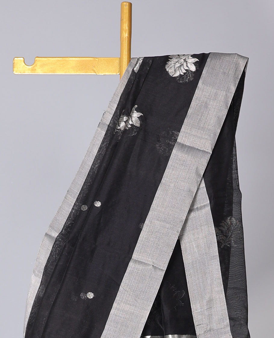 Black Chanderi cotton saree with buttas, plain border & pallu of floral zari designs