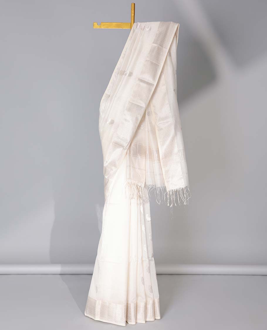 Cream Maheshwari cotton saree with paisley buttas, traditional zari border & zari motifs pallu