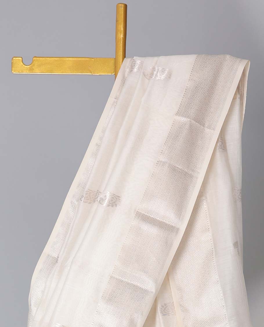 Cream Maheshwari cotton saree with paisley buttas, traditional zari border & zari motifs pallu