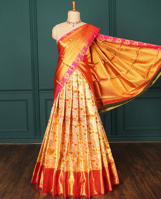 Orange jacquard pure silk half saree,jaal dhavani,contrast jacquard blouse & border of thilakam,muthu,mayil & mayil kann
