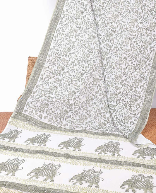 Cream floral printed mul-mul cotton saree, self-border & pallu of elephant motifs print
