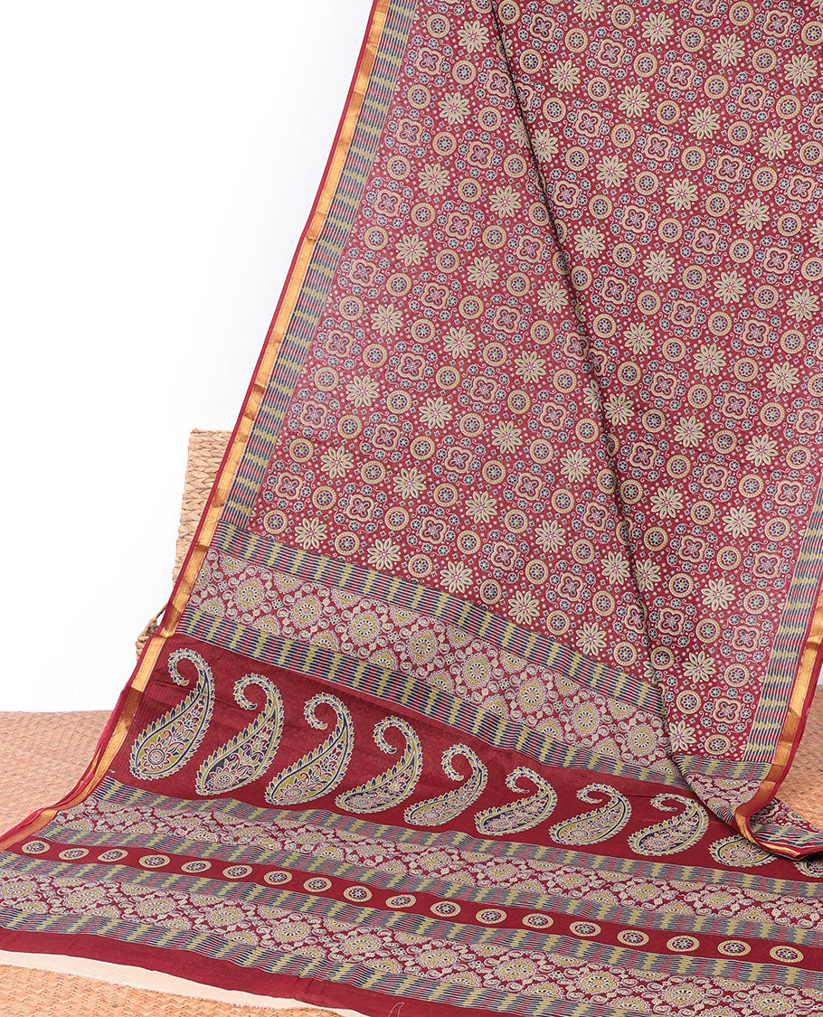 Maroon ajrakh-style printed mul-mul cotton saree, self-border & intricately printed pallu