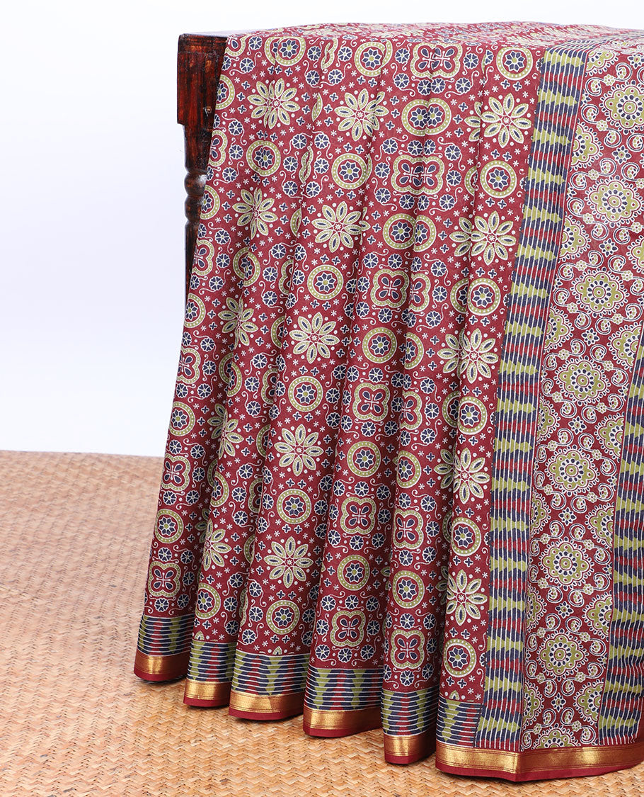 Maroon ajrakh-style printed mul-mul cotton saree, self-border & intricately printed pallu