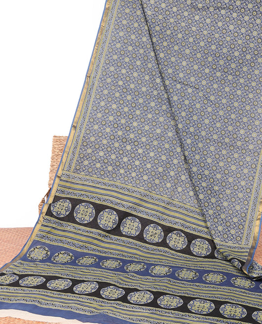 Blue ajrakh-style printed mul-mul cotton saree, self-border & intricately printed pallu