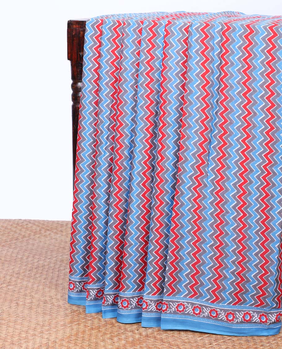 Multi-color chevron striped printed mul-mul cotton saree, floral printed border & intricate pallu