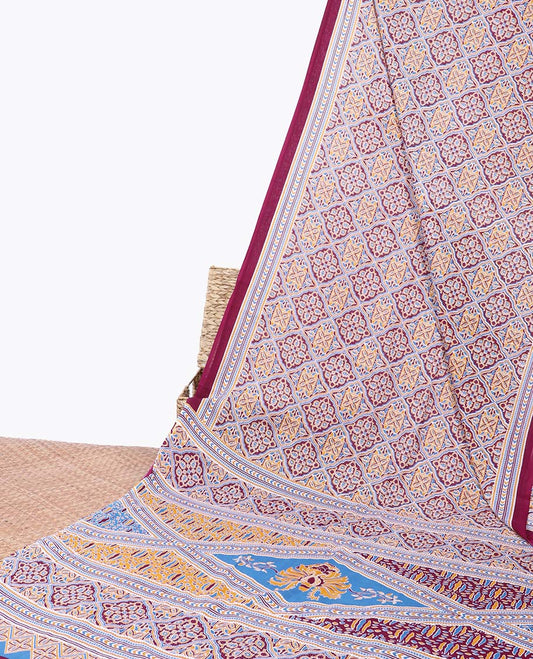 Maroon ajrakh printed mul-mul cotton saree, geometric printed border & intricately printed pallu