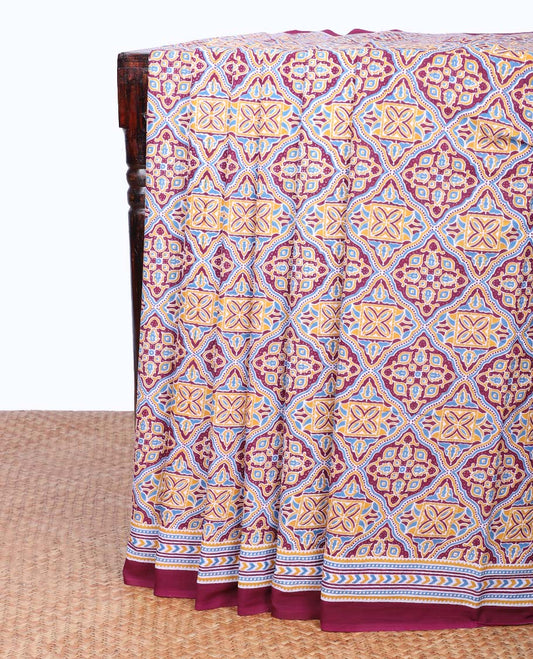 Maroon ajrakh printed mul-mul cotton saree, geometric printed border & intricately printed pallu