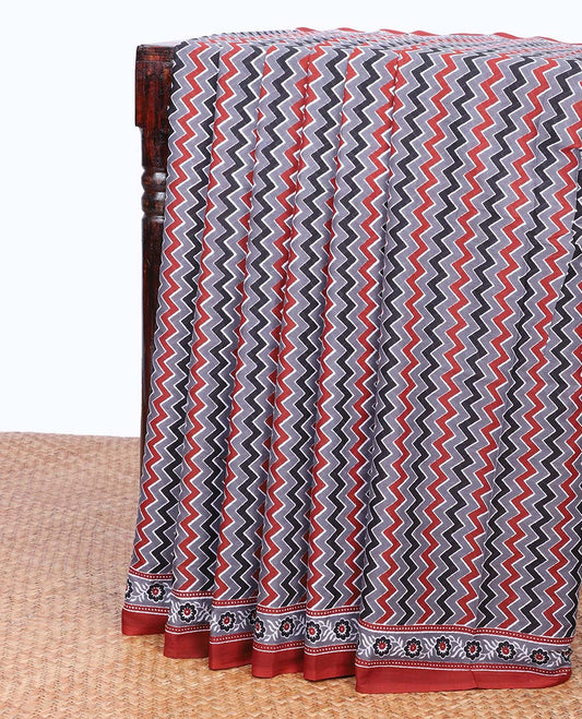 Multi-color chevron striped printed mul-mul cotton saree, floral printed border & intricate pallu