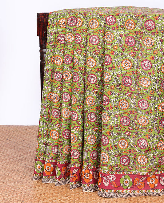 Green floral vine machine-printed kalamkari cotton saree, contrast floral border & intricately printed pallu