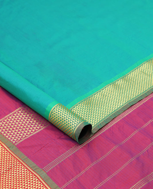 Green plain design ten-yard saree, contrast border & pallu of ara maadam designs