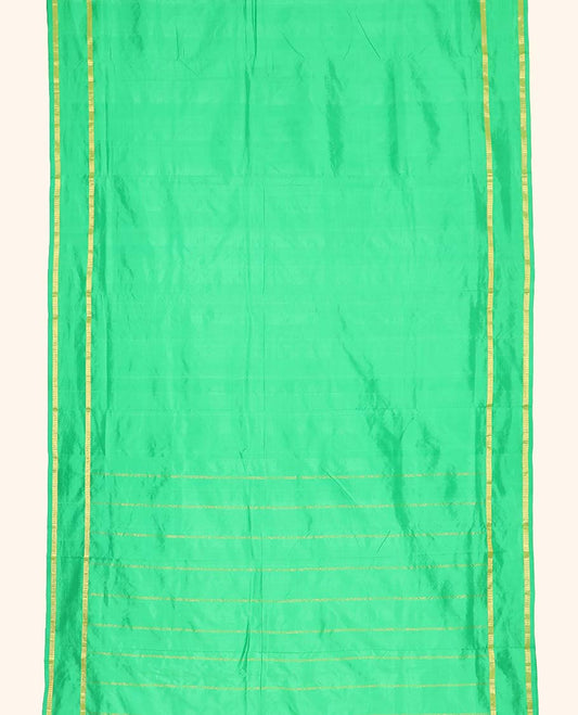 Green plain design ten-yard saree, rettai pettu zari border & pallu of zari designs