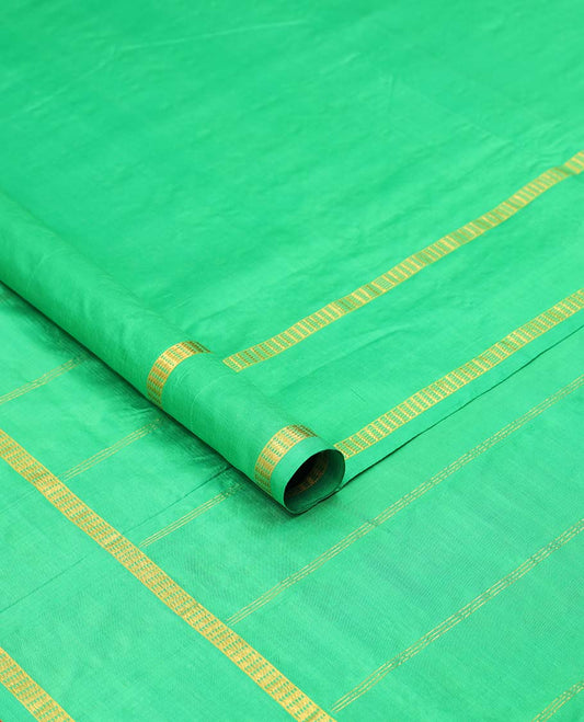 Green plain design ten-yard saree, rettai pettu zari border & pallu of zari designs