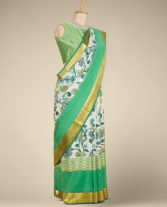 Cream floral vine printed mysore silk saree, contrast border steeped with traditional designs in zari