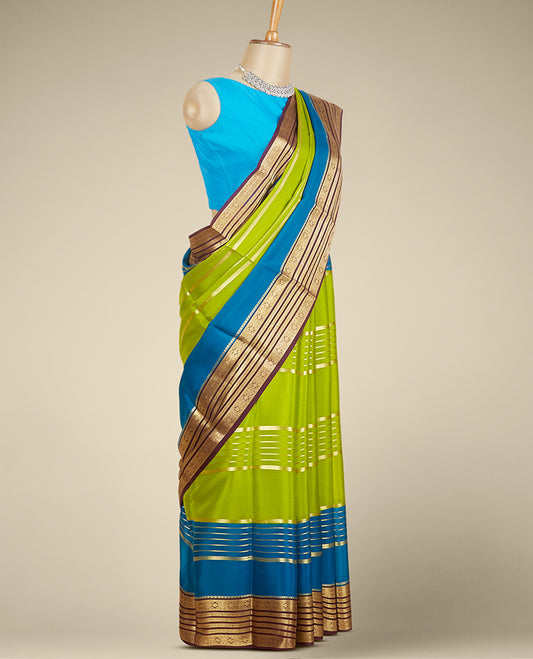 Green mysore silk saree with zari designs, contrast border steeped with traditional zari designs