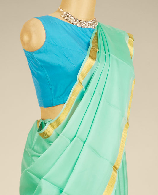 Green plain design mysore silk saree, zari border of traditional designs