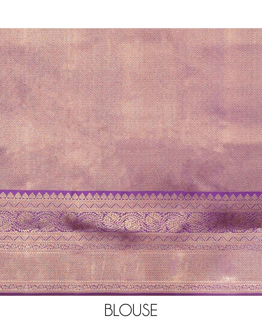 Borderless purple kanchipuram designer silk saree features paisleys, zari-rich pallu adorned with seppu rekku design