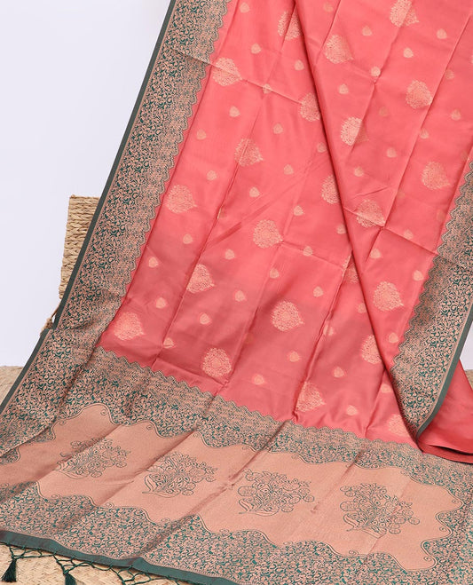 Peach butter silk saree with zari buttas, contrast floral design border & pallu of zari intricate designs