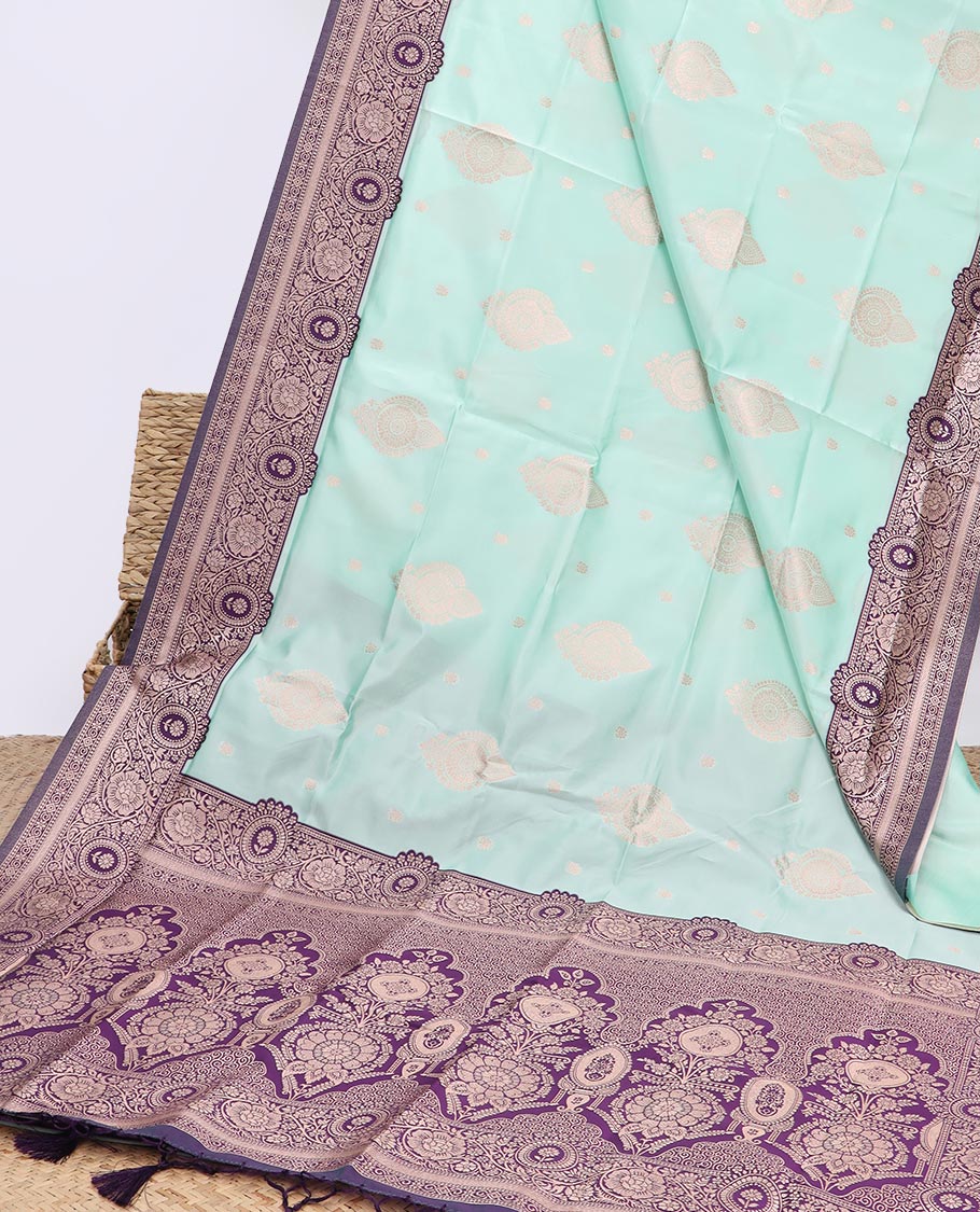 Celeste blue butter silk saree with zari buttas, contrast floral creeper design border & pallu of zari intricate designs