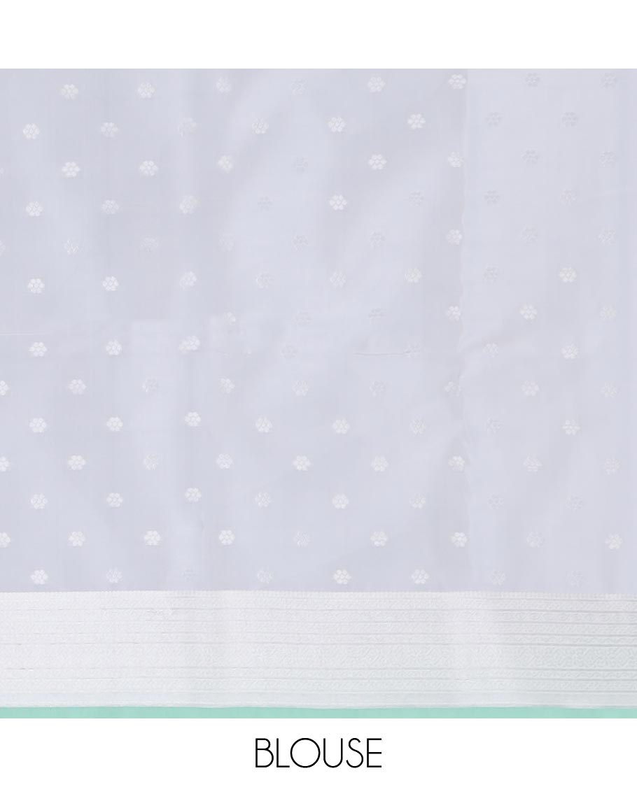 Green floral jacquard butter silk saree, contrast traditional design border & pallu of floral designs
