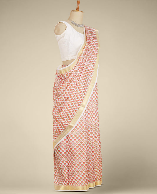 Cream floral motifs printed silk saree, paisley motifs zari border