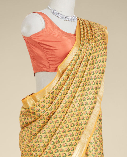 Orange floral motifs printed silk saree, traditional zari design border
