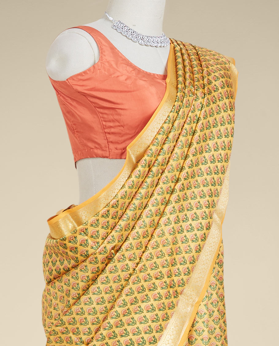 Orange floral motifs printed silk saree, traditional zari design border