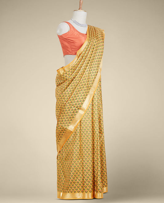 Orange floral motifs printed silk saree, traditional zari design border