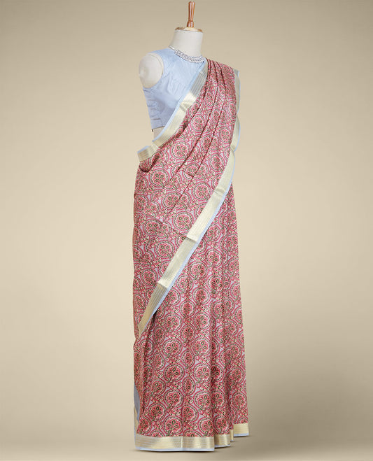 Red intricately printed silk saree, contrast traditional zari design border