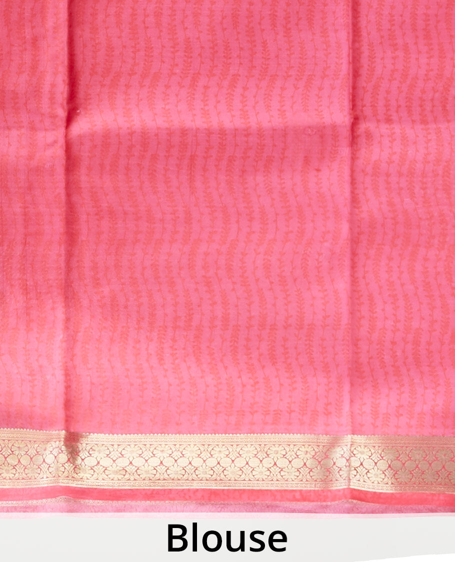 Pink intricately printed silk saree, traditional zari design border