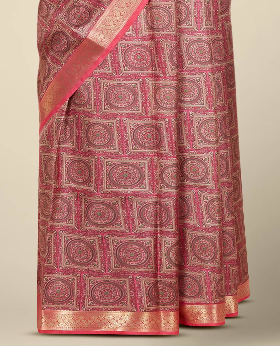 Pink intricately printed silk saree, traditional zari design border