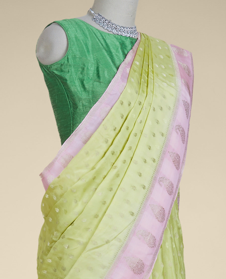 Green mysore silk saree with buttas, contrast border features zari paisley designs