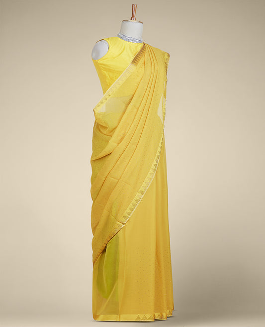 Yellow stone embroidered pure chiffon saree, stone embroidered border