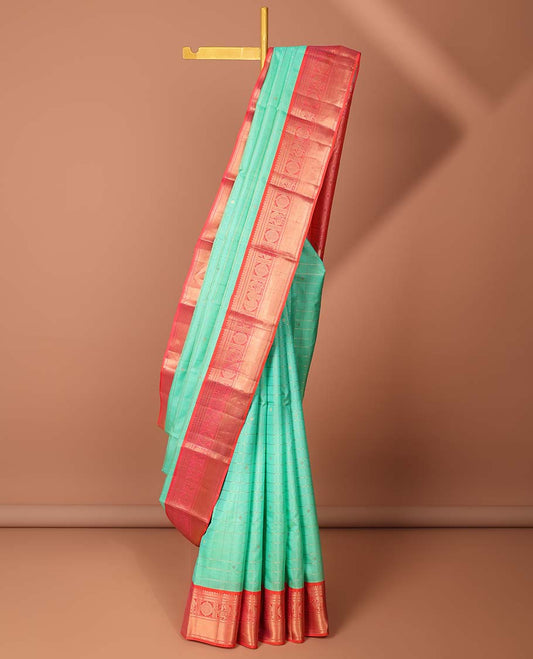 Blue checked silk saree with buttas, contrast jaal pallu & border of thilakam mokku,kathir,mayil chakram & muthu