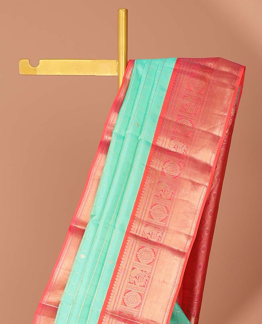 Blue checked silk saree with buttas, contrast jaal pallu & border of thilakam mokku,kathir,mayil chakram & muthu